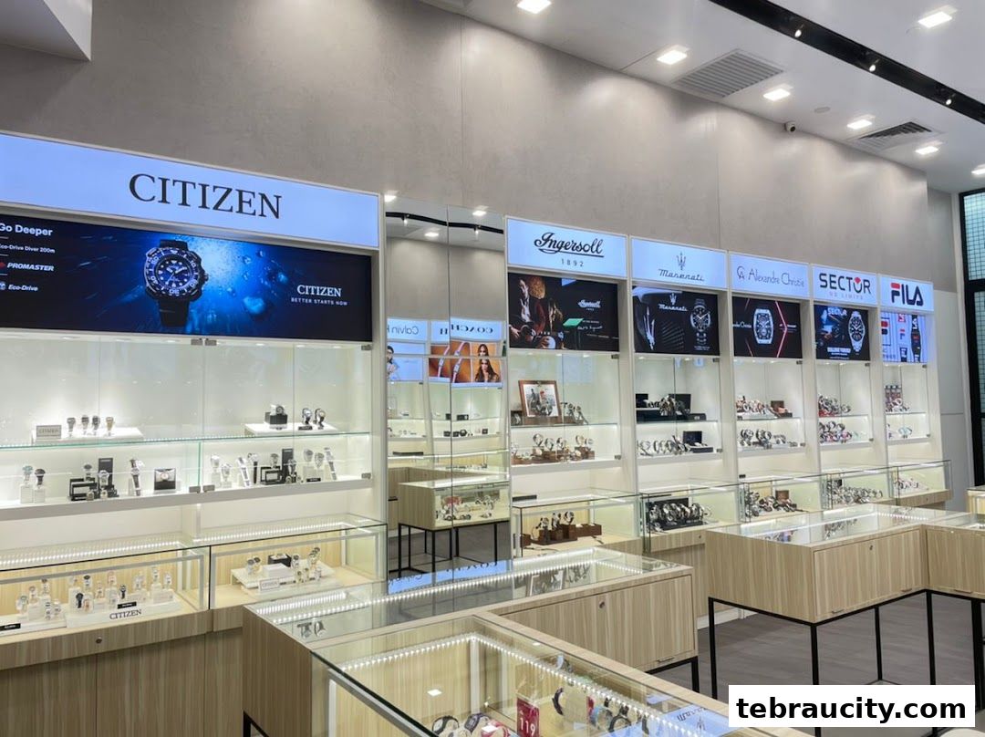 A well-lit retail store interior showcasing a variety of watch brands in display cases.