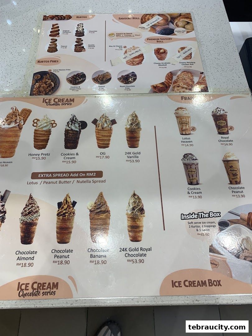 A menu displaying various ice cream cones, savory rolls, and kurtos fries with prices.