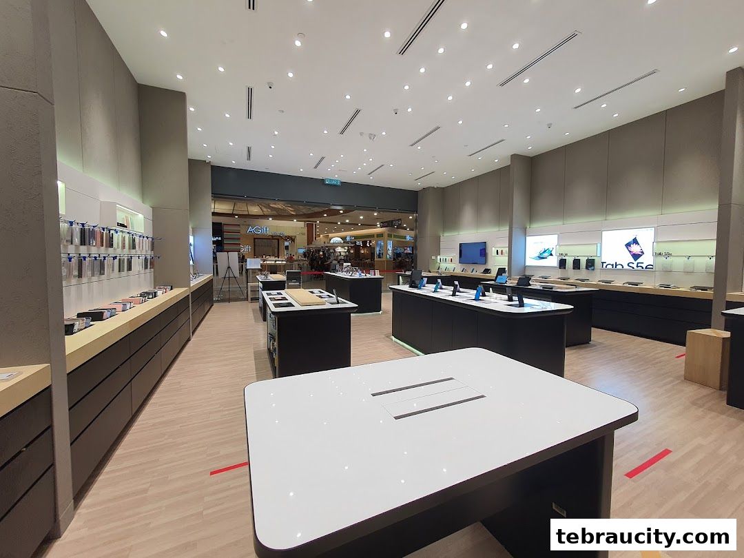 Interior view of a modern Samsung Experience Store showcasing various electronic devices and accessories.