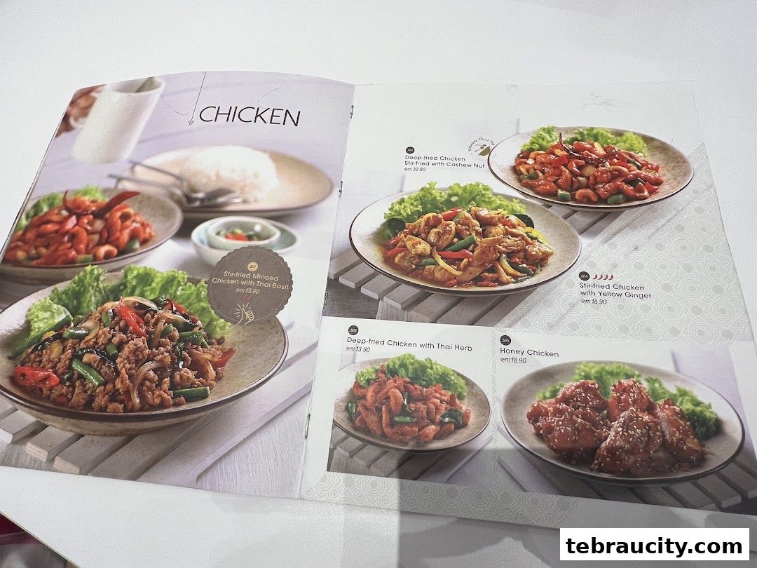A menu page showcasing various chicken dishes with appetizing images and prices.