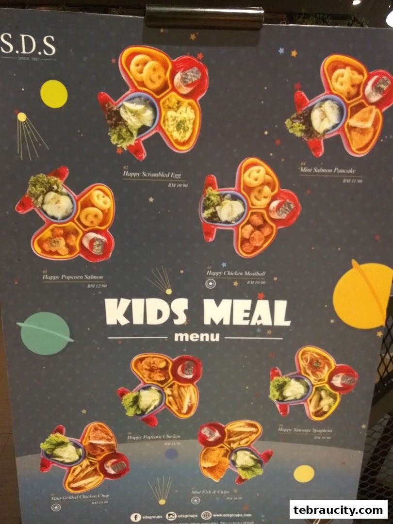 A menu board displaying various kids' meal options presented in airplane-shaped containers.