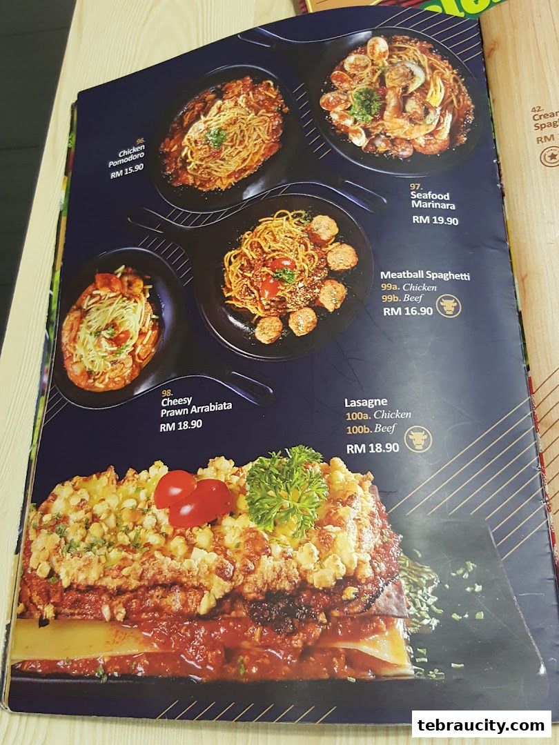 A menu page from SDS Bakery Cafe featuring various pasta dishes and a large lasagna.