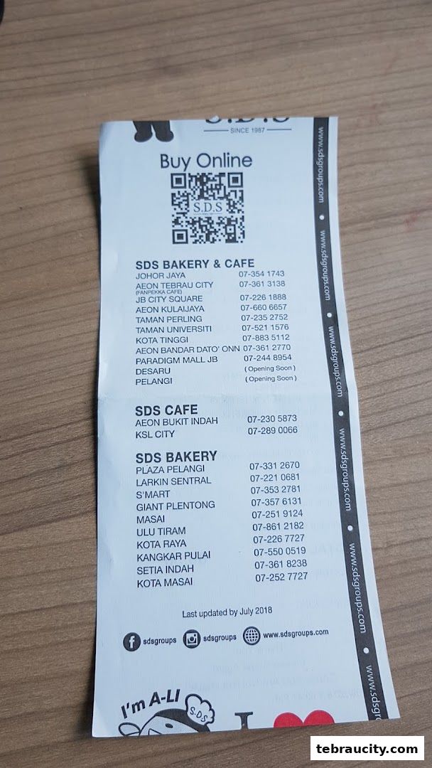 A flyer listing SDS Bakery & Cafe and SDS Bakery locations and contact numbers.