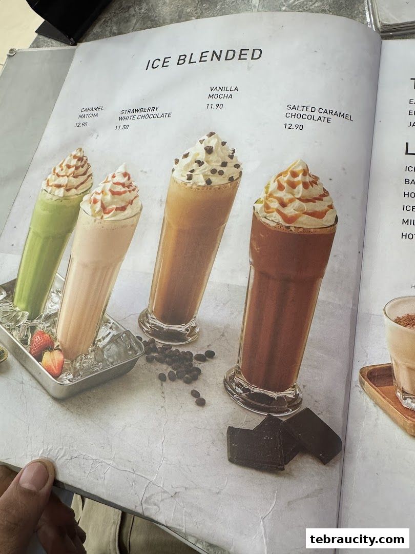 A menu page showcasing four delicious ice-blended drinks with toppings and ingredients.