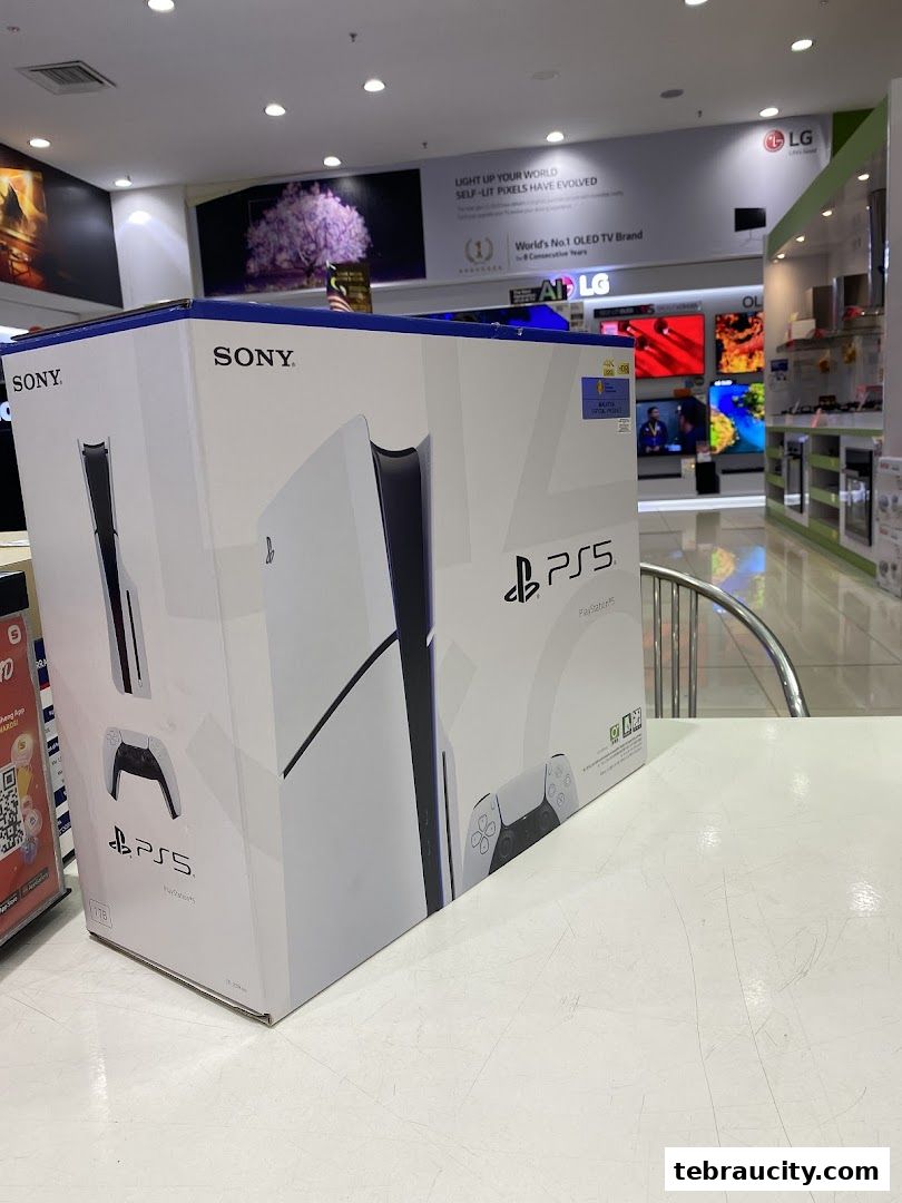 A Sony PlayStation 5 console box is displayed in an electronics store.