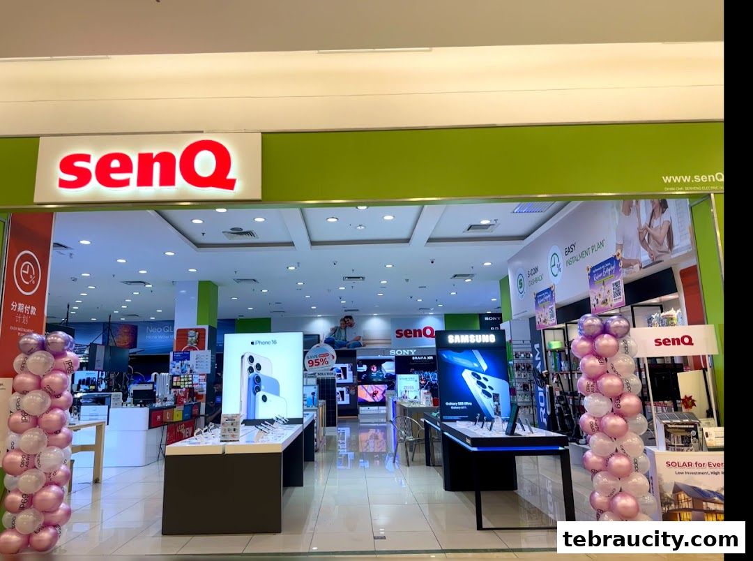 The entrance of a senQ electronics store, showcasing smartphones and other gadgets.