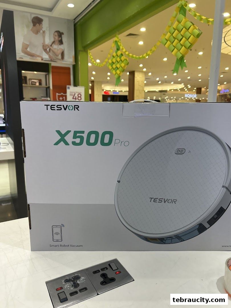 A Tesvor X500 Pro smart robot vacuum cleaner box with a remote control in front.
