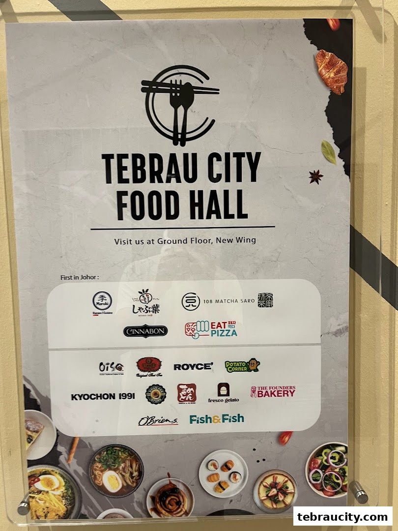 A sign advertising the Tebrau City Food Hall with various restaurant logos and food images.