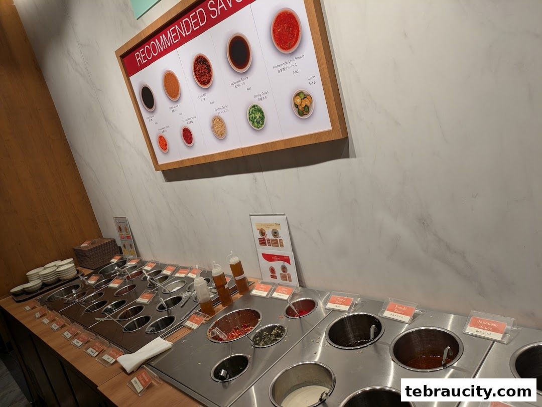 A display of various sauces and ingredients for customizing hot pot meals.
