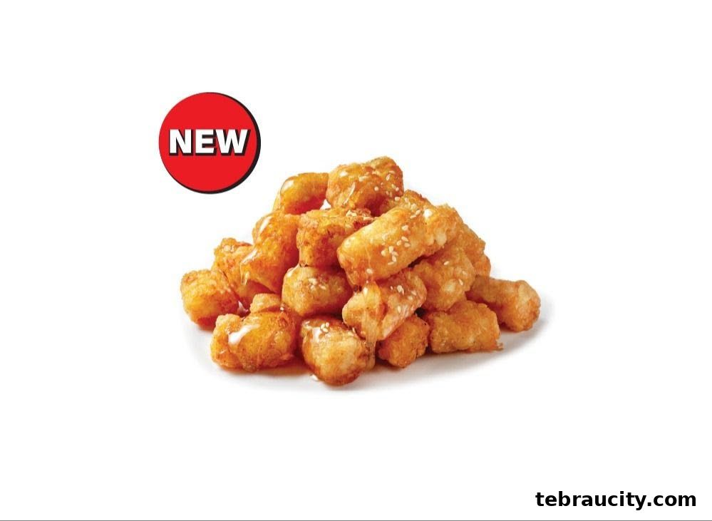 A pile of crispy fried snacks drizzled with sauce and sprinkled with sesame seeds, with a 'NEW' tag.