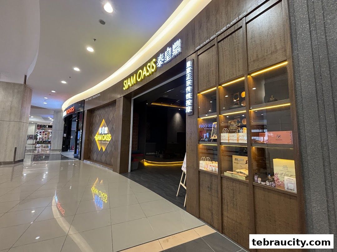 The exterior of Siam Oasis, a shop in AEON Mall Tebrau City, featuring a modern wooden facade and display shelves.