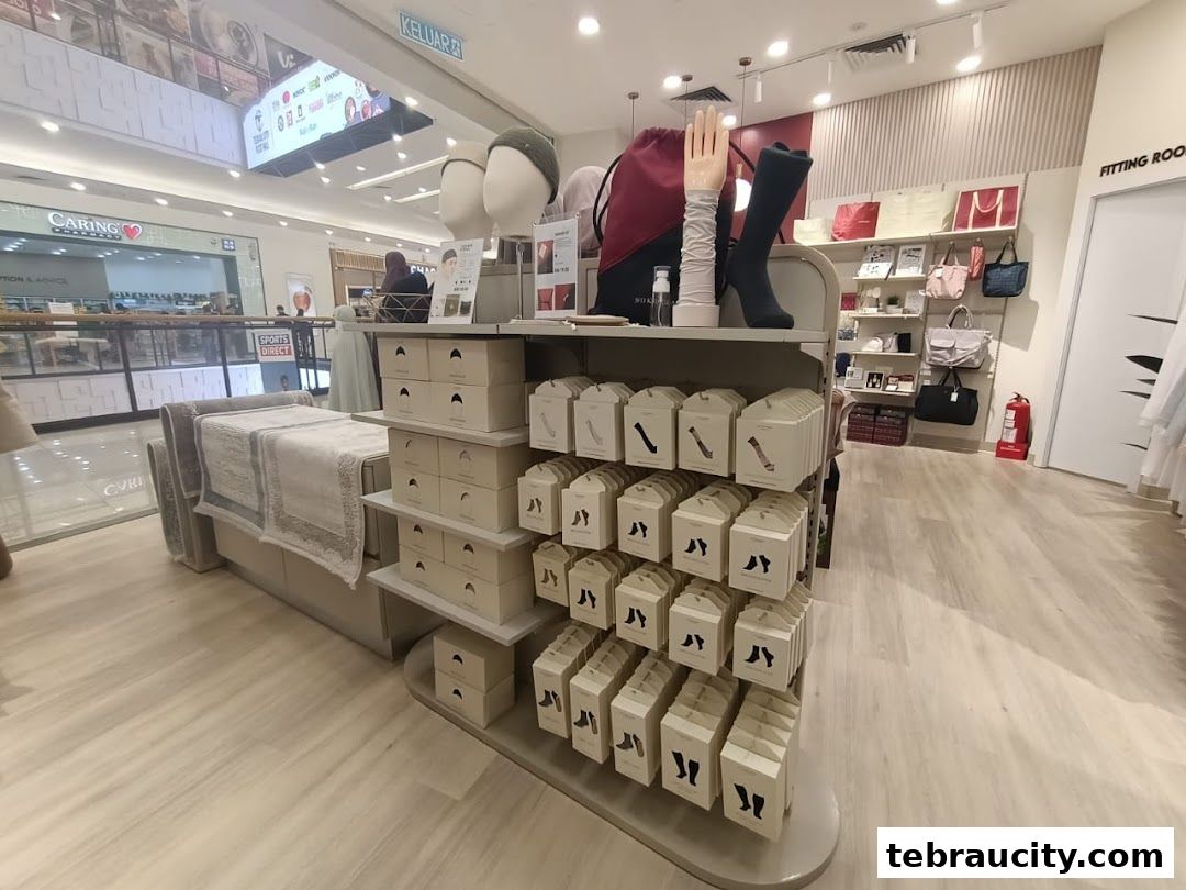 Interior view of a retail shop displaying various fashion accessories and home goods.