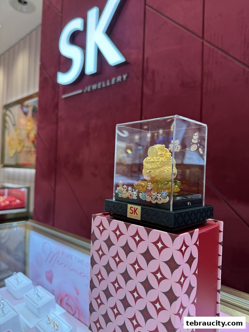 SK Jewellery shop interior with a display of gold ornaments and jewelry.