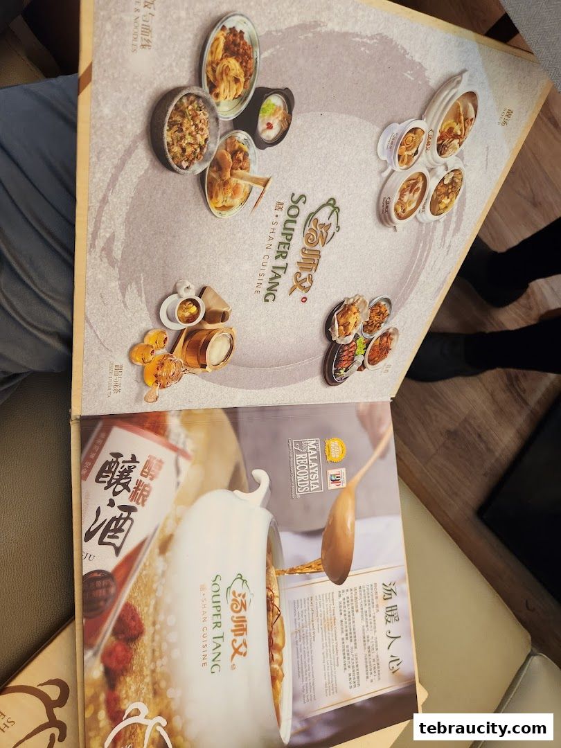 A menu from Souper Tang showcasing various dishes and drinks with appealing food photography.
