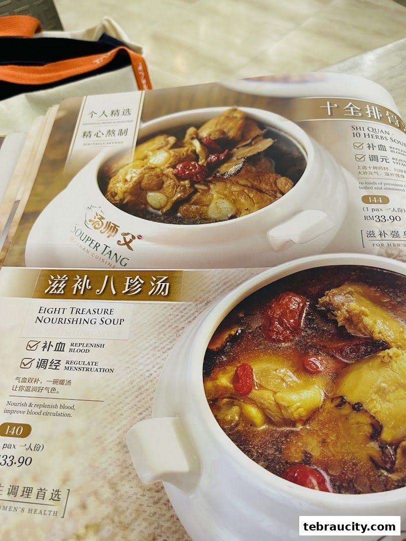 A menu from Souper Tang showcasing nourishing soups with detailed descriptions and prices.