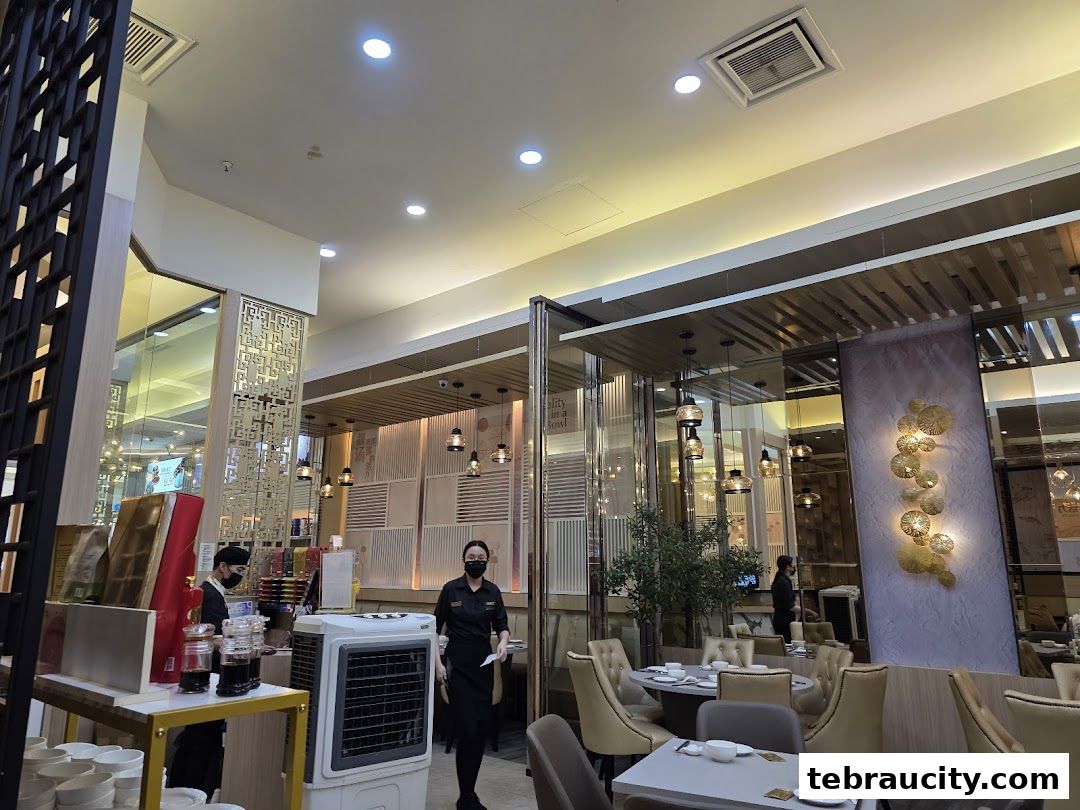 Interior view of a modern restaurant with elegant decor and dining tables.