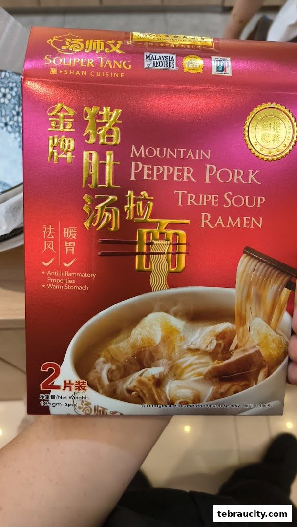 A box of Souper Tang Mountain Pepper Pork Tripe Soup Ramen with ingredients and benefits listed.