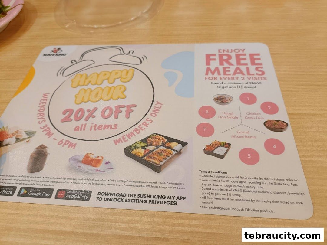 A placemat from Sushi King promoting happy hour and a free meals loyalty program.