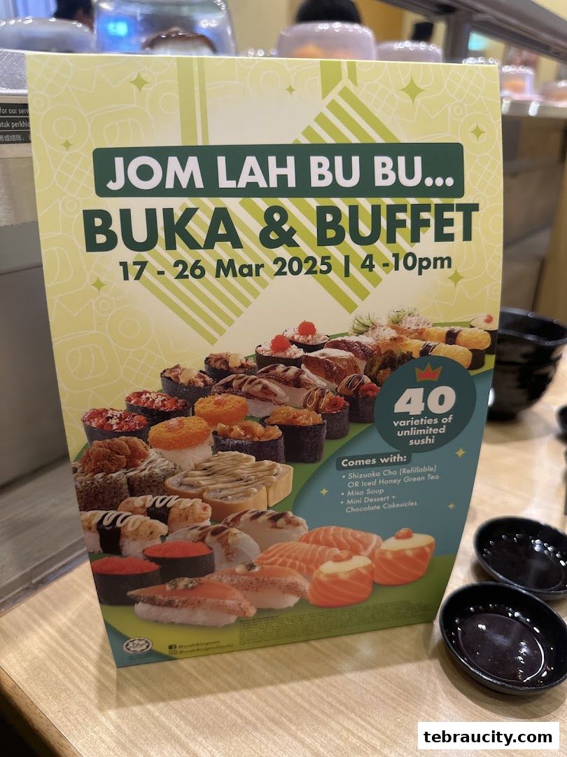 A promotional sign for Sushi King's Buka & Buffet event featuring 40 varieties of unlimited sushi.