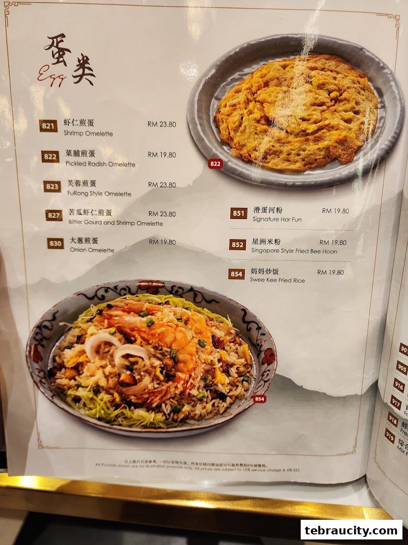 A menu page featuring various omelettes, hor fun, bee hoon, and fried rice dishes.
