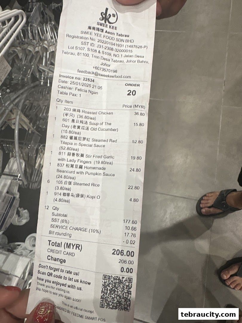 A receipt from Swee Kee Chicken Rice showing a list of food items and their prices.
