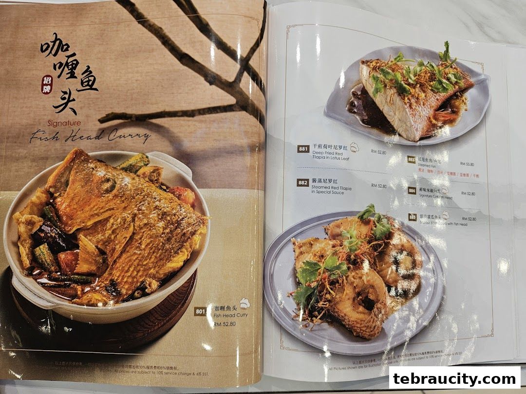 A menu featuring signature fish head curry and other fish dishes with prices.