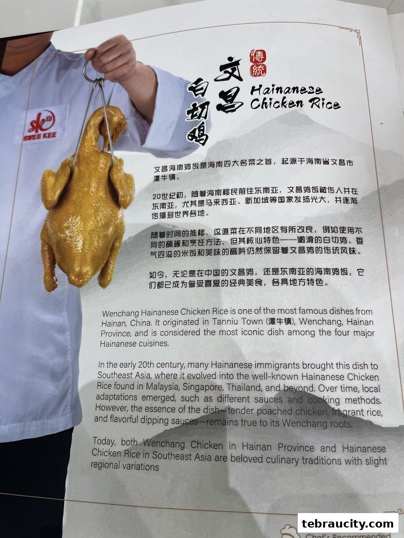 A person holding a whole cooked chicken with text about Hainanese Chicken Rice.