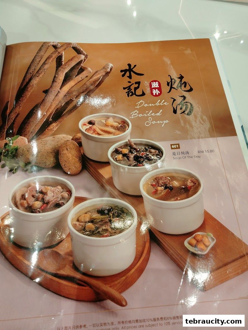 A menu page showcasing various double boiled soups with appetizing visuals.