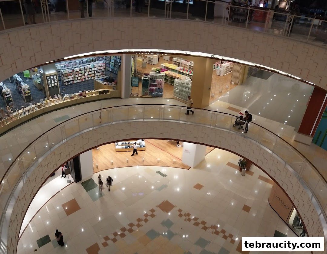 View of a shopping mall interior with multiple levels and shops visible.