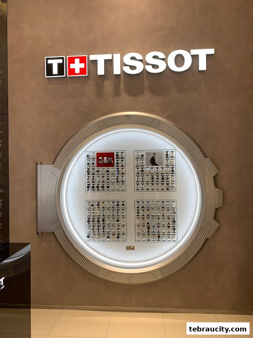 Tissot Boutique shop front with a large circular display showcasing various watches.
