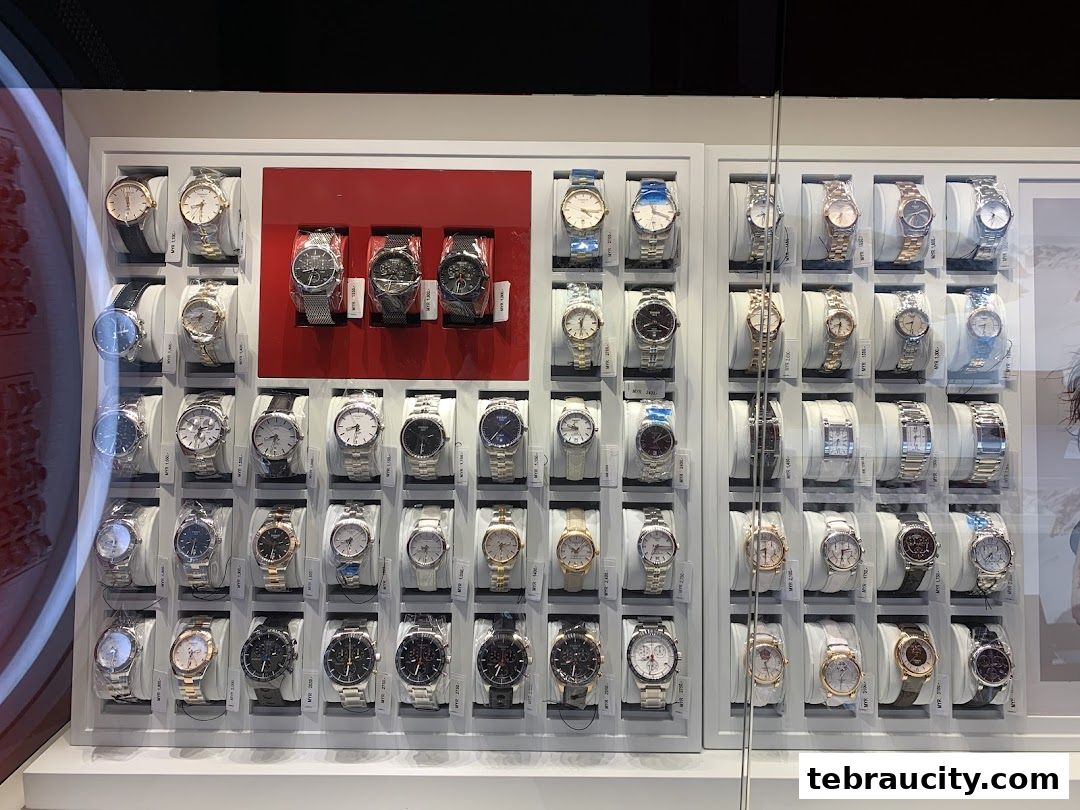 A display of various Tissot watches in a retail store, showcasing different styles and designs.