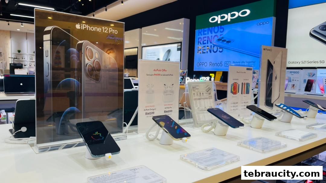 Display of Apple iPhones and Oppo phones with promotional offers.