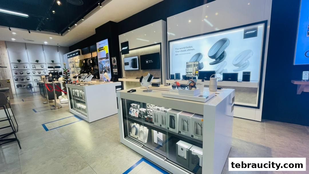 Interior view of a modern electronics store showcasing Bose products and displays.