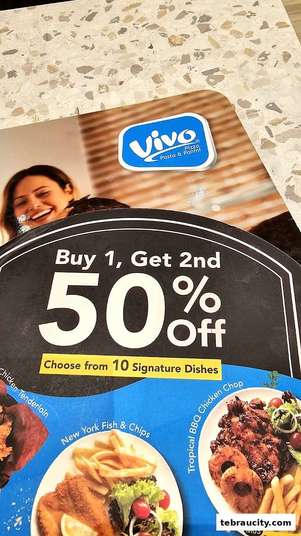 A promotional flyer for Vivo Pizza, featuring a 'Buy 1, Get 2nd 50% Off' deal on signature dishes.
