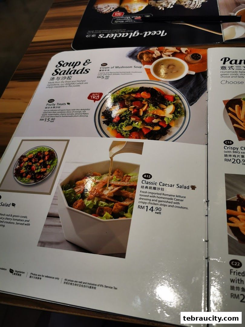 A menu page featuring soups, salads, and other dishes with prices and descriptions.