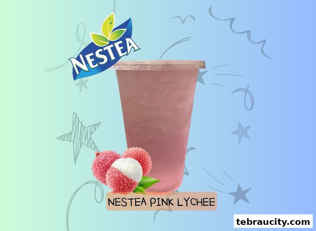A refreshing glass of Nestea Pink Lychee drink with fresh lychees and the Nestea logo.