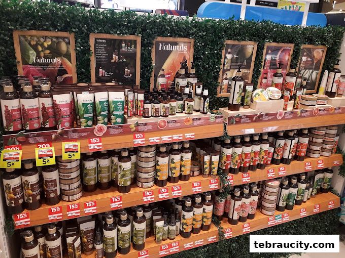 A display of natural beauty and skincare products with various discounts advertised.