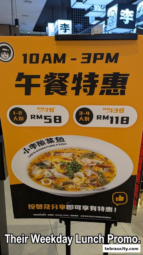A promotional sign for Lee's Signature Fish offering weekday lunch specials.
