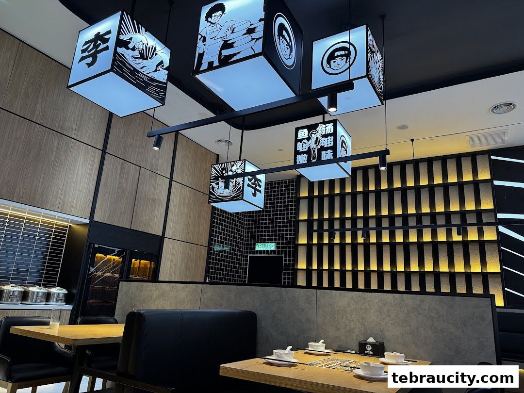 Interior of a modern restaurant with stylish lighting and seating arrangements.