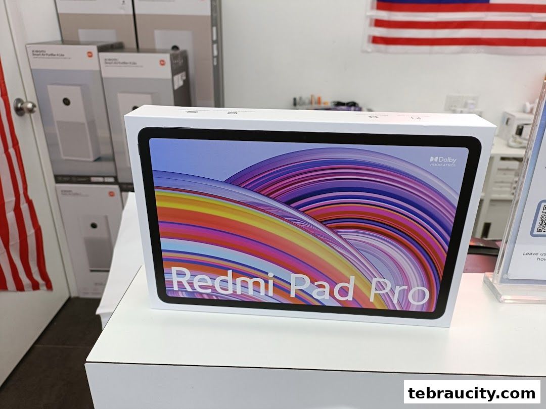 A Xiaomi Redmi Pad Pro box is displayed prominently in front of stacked air purifiers.