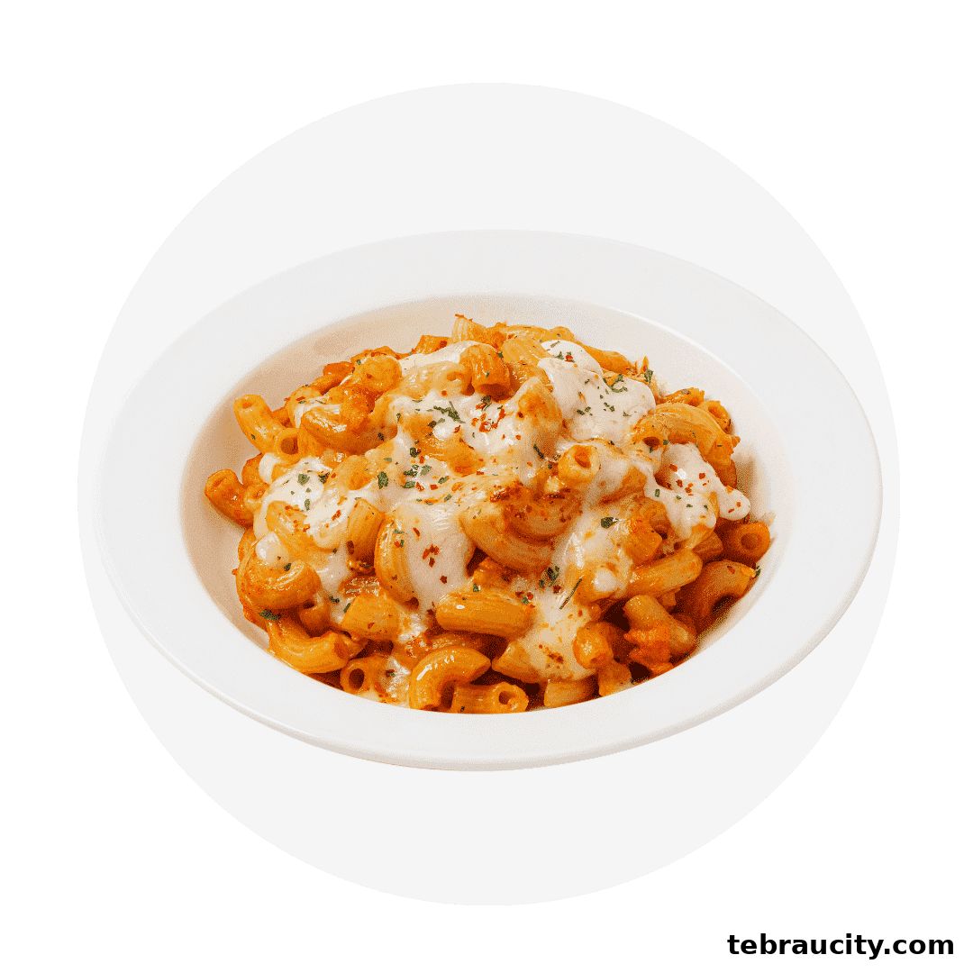 A bowl of macaroni pasta topped with melted cheese and herbs.