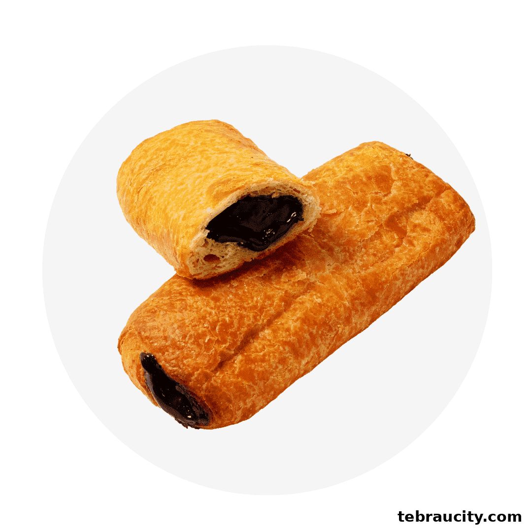 Two golden-brown chocolate croissants, one sliced to reveal rich dark chocolate filling.