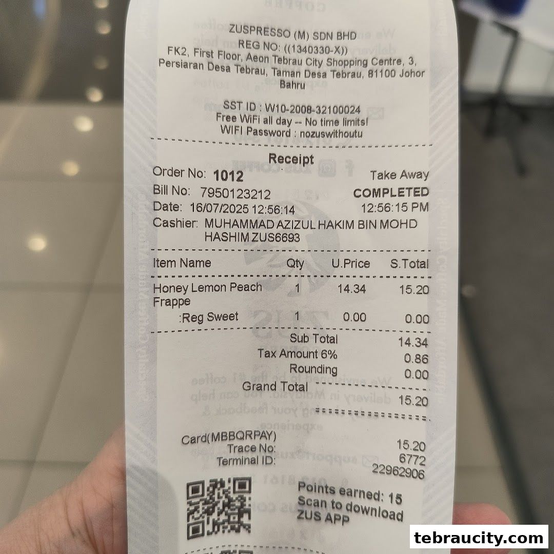 A receipt from ZUS Coffee showing a Honey Lemon Peach Frappe order.